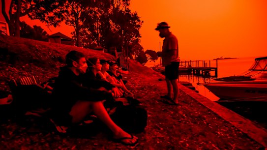 Day turned to a blood red sky on Saturday in Mallacoota with the South Westerly change sparking up fire activity in the area.