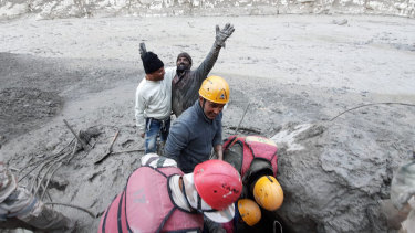 A man after being rescued from the flood in northern India.