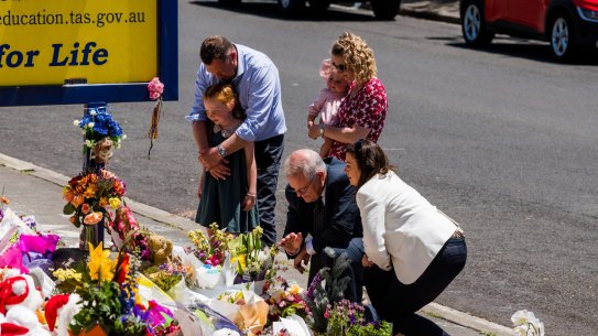 Prime Minister Scott Morrison and his wife Jenny at Hillcrest Primary School on Saturday. With them is member for Braddon Gavin Pearce.