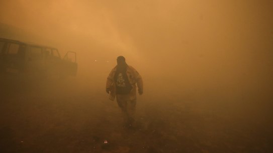 Bumbalong residents defending their property as a bushfire burning south of Canberra threatens  communities in Bumbalong and the region, on Saturday 1 February 2020. fedpol Photo: Alex Ellinghausen