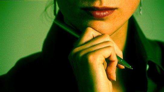 Business woman, Melb.021205.AFR.pic by Erin Jonasson. generic hold for files, first usa AFR please... Woman thinking with pen in hand , work, office, job, career, employment, think, strategy, plan, writing, write, take note, advise, record, document, female***afrphotos.com***