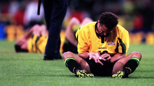 Graham Arnold cut a shattered figure after Australia’s 2-2 draw with Iran in 1997 - his last match for his country.