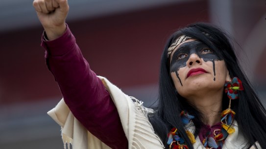 MADRID, SPAIN - DECEMBER 08: An indigenous leader from Brazil takes part in a protest outside REPSOL Headquarters on December 08, 2019 in Madrid, Spain. Indigenous leaders and activists are protesting in Madrid against oil contamination and the fossil fuel industry in Brazil because of the damage it provokes to the poorest communities, sea life, food supplies and the climate. (Photo by Pablo Blazquez Dominguez/Getty Images) *** BESTPIX ***
