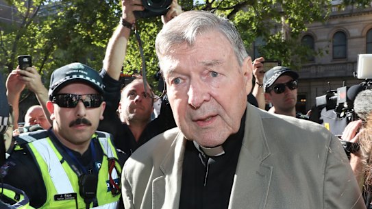 Cardinal George Pell arrives at County Court in Melbourne. 