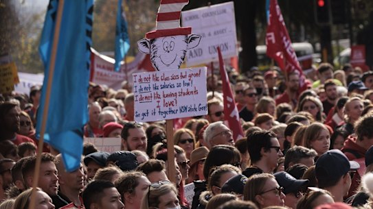 Teachers march to State Parliament as part of a day of strike action in June.