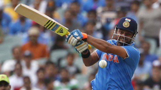 India's batsman Suresh Raina plays a shot during their Cricket World Cup match against Pakistan in Adelaide, February 15, 2015.    REUTERS/David Gray  (AUSTRALIA - Tags: SPORT CRICKET)
