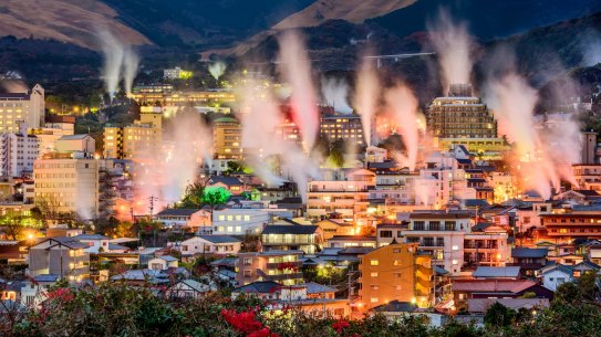 Steam rises from hot spring bath houses in Beppu.