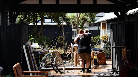 Water levels are dropping and clean up has begun after severe flooding hits Lismore in northern NSW in the worst flood ever recorded on Wednesday March 2 2022. Sarah Jones and Kym Strow lost their business in town and their home on Dawson Street. Photo: Elise Derwin / SMH. .