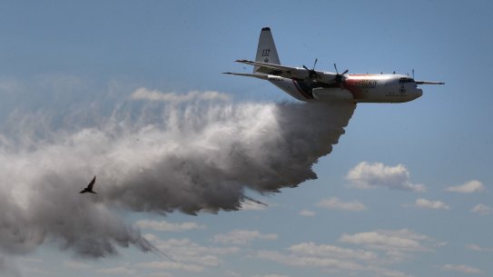 An RFS large air tanker C-130 Hercules, nicknamed 'Thor', does a water drop for media in 2017.