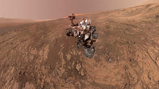 FILE - This composite image made from a series of Jan. 23, 2018 photos shows a self-portrait of NASA's Curiosity Mars rover on Vera Rubin Ridge. On Thursday, June 7, 2018, scientists said the rover found potential building blocks of life in an ancient lakebed and confirmed seasonal increases in atmospheric methane. The rover's arm which held the camera was positioned out of each of the dozens of shots which make up the mosaic. (NASA/JPL-Caltech/MSSS via AP)