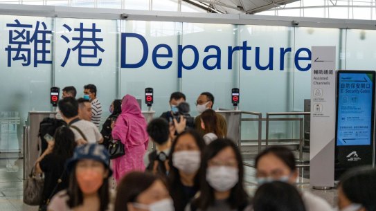Travellers in the departure hall at Hong Kong International Airport in Hong Kong, China.