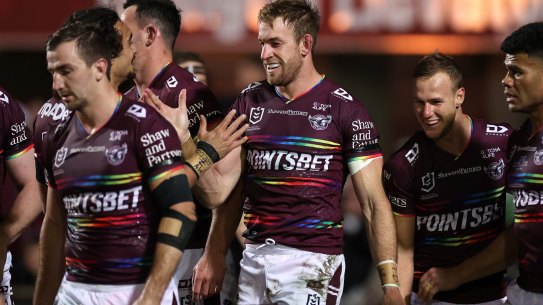 SYDNEY, AUSTRALIA - JULY 28:  Andrew Davey of the Sea Eagles celebrates with team mates after scoring a try during the round 20 NRL match between the Manly Sea Eagles and the Sydney Roosters at 4 Pines Park on July 28, 2022, in Sydney, Australia. (Photo by Cameron Spencer/Getty Images)