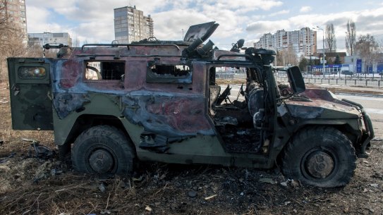A damaged and burnt military vehicle is seen after fighting in Kharkiv, Ukraine, on Sunday