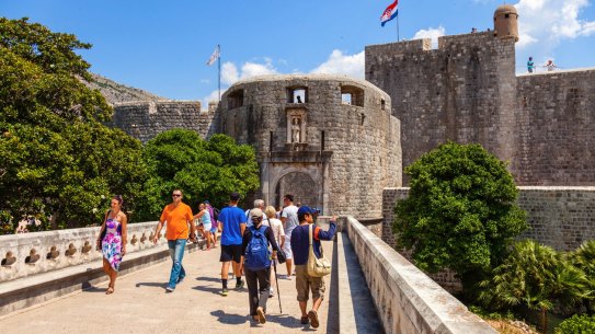 Tourists outside the Pile Gate in Dubrovnik, Croatia.