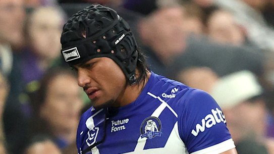 Stephen Crichton of the Bulldogs walks off the field.
