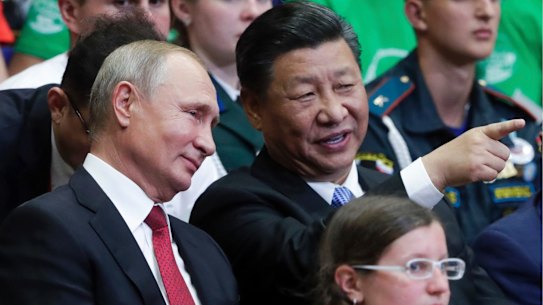 Russian President Vladimir Putin, left, and Chinese President Xi Jinping visit the Ocean Russian children recreation center after at the Eastern Economic Forum in Vladivostok, Russia, Wednesday, Sept. 12, 2018. (Mikhail Metzel/TASS News Agency Pool Photo via AP)