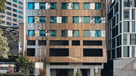 The most significant change is the new bronze stainless steel cladding across the entire facade.