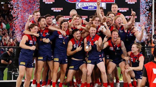 The Demons celebrate their grand final win in Perth last year.