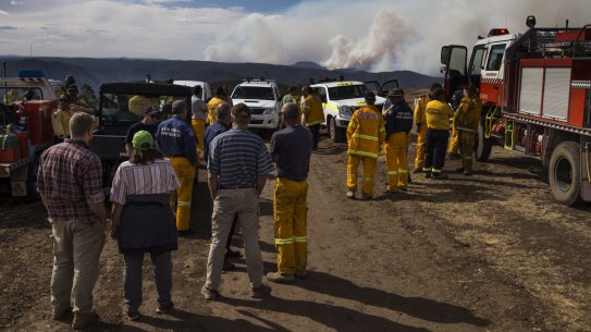 RFS crews watch from High Range ond December 1 as the Green Wattle Creek fire began its surge towards Lake Burragorang, Sydney's main reservoir behind Warragamba dam