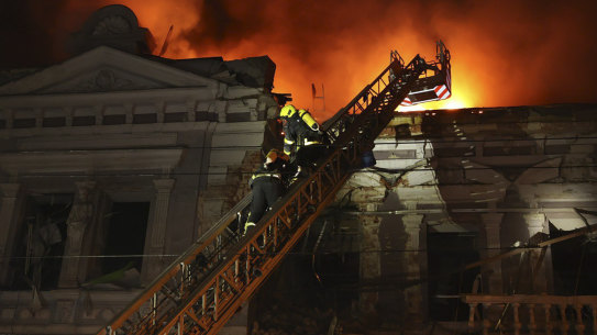Firefighters put out a fire after Russia’s missile attack in Kharkiv, Ukraine.