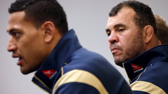 Better days: Israel Folau and Michael Cheika in 2015. 