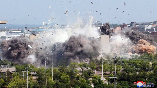 This photo provided by the North Korean government shows the explosion of an inter-Korean liaison office building in Kaesong, North Korea, on Tuesday.