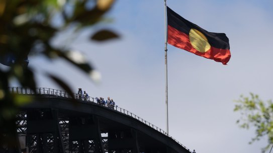 The government will spend $25 million installing a third flagpole on the Sydney Harbour Bridge.