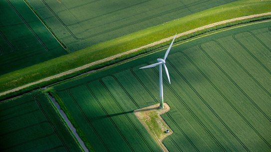 A wind turbine on farm land near Hamburg, Germany.
