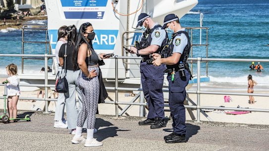 Police patrol Bondi Beach in August 2021 to enforce public health orders.