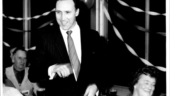 Treasurer Paul Keating enjoys a beer at the Bankstown Sports Bowling Club. July 11, 1987.