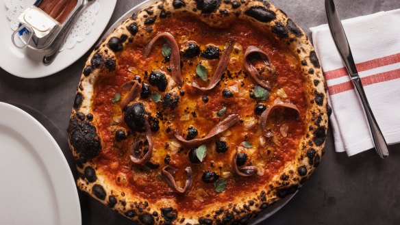 Pizza marinara scattered with optional Ortiz anchovies at Bella Brutta, Newtown. 