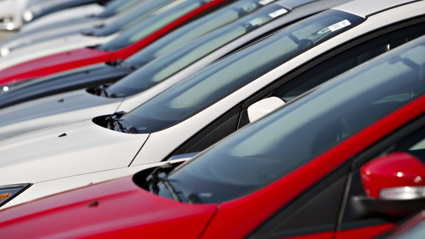 Buyers hit the brakes on new car sales last year