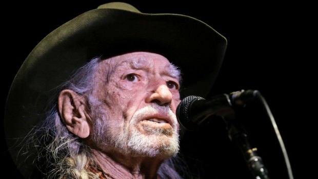 Willie Nelson is playing his first-ever political concert and some fans are abandoning him