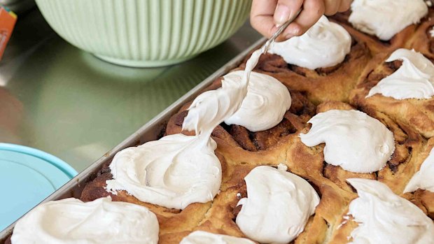 Preparing cinnamon buns with maple whipped cream at Ard, Stanmore.