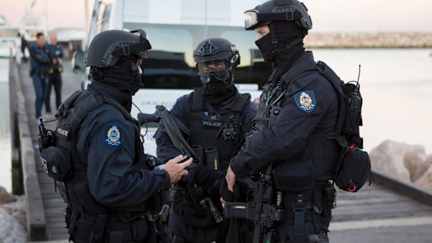 Australian Border Force and police officers conduct a drug raid last year.