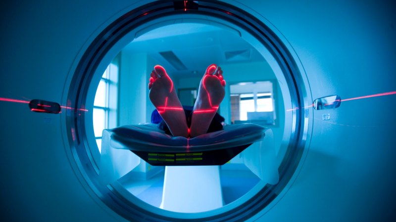 Promised hospital scanners $25m over budget and four years late