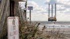 Construction is underway off a Hamptons Beach on the first big offshore wind farm in US waters.