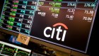 A monitor displays Citigroup signage on the floor of the New York Stock Exchange.