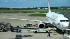 A Virgin Australia aircraft at Brisbane Airport. Brisbane is one of the worst affected by Airservices staff shortages.