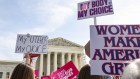 Pro-choice demonstrators outside the US Supreme Court in Washington last month. The issue could sway the November election.