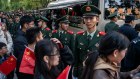 People’s Liberation Army soldiers stand guard in Tiananmen Square in October.