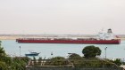 A crude oil tanker moving along the Suez Canal. The area has been difficult territory for tankers, pushing up oil prices.