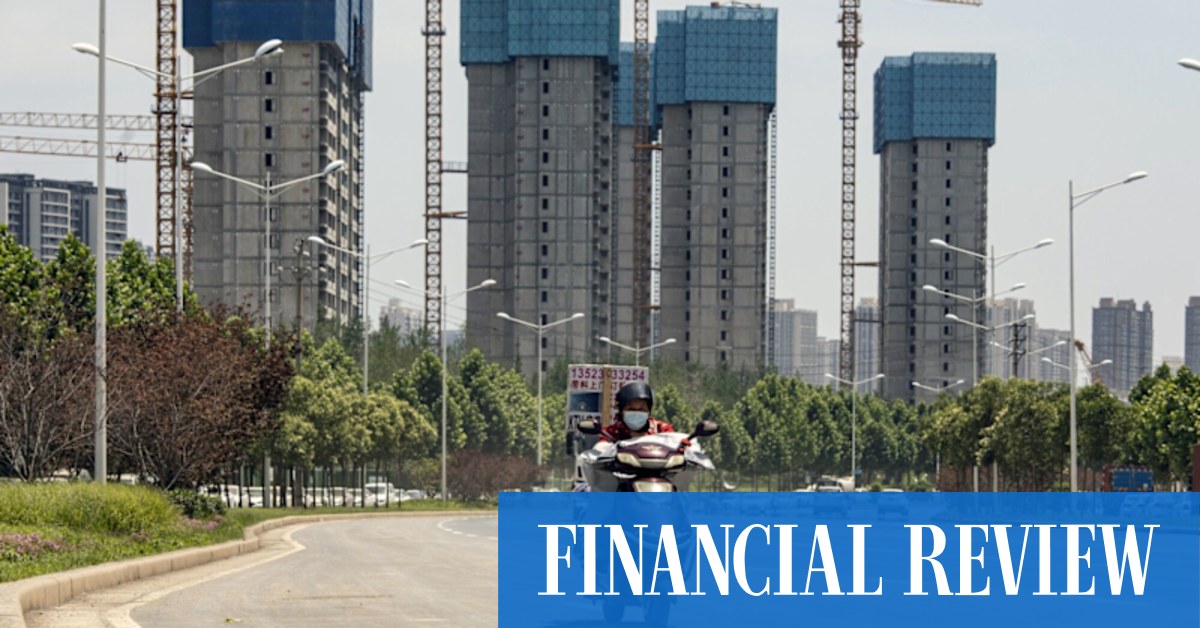 China trust giant's missed payments alarms investors - Vimarsana News