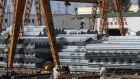 Bundles of steel tubes at a trading market in the outskirts of Shanghai. Chiina’s steel output continues to decline.