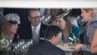 Then-CEO Michael Cameron spied having lunch with then-Liberal MP Kelly O’Dwyer in the Suncorp marquee at Flemington in 2018.