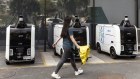 Autonomous delivery vehicles for Cainiao near the Alibaba Group headquarters in Hangzhou, China. There are concerns around Alibaba’s European hub in Belgium.