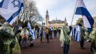 Pro-Israel demonstrators march towards the International Court of Justice in The Hague, Netherlands.