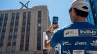 A pedestrian takes a photograph of the new Twitter X logo at the company’s headquarters in San Francisco last year.