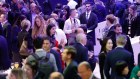 Upbeat mood. Attendees at the welcome reception of the World Economic Forum (WEF) in Davos.