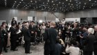 Japanese media interview a CEO in Tokyo.
